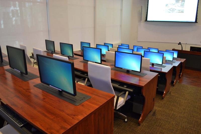 Training desks with trolley monitor lift